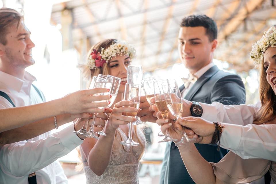 Bridal partying drinking wine