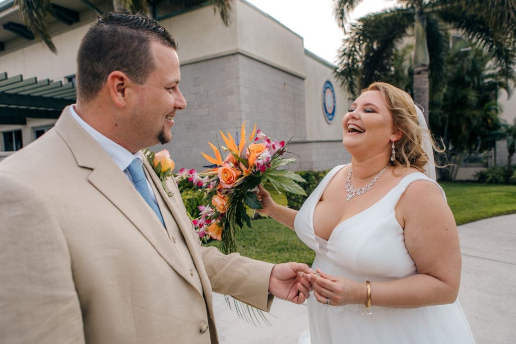 Groom giving pride pebble at Belleair Beach Community Center