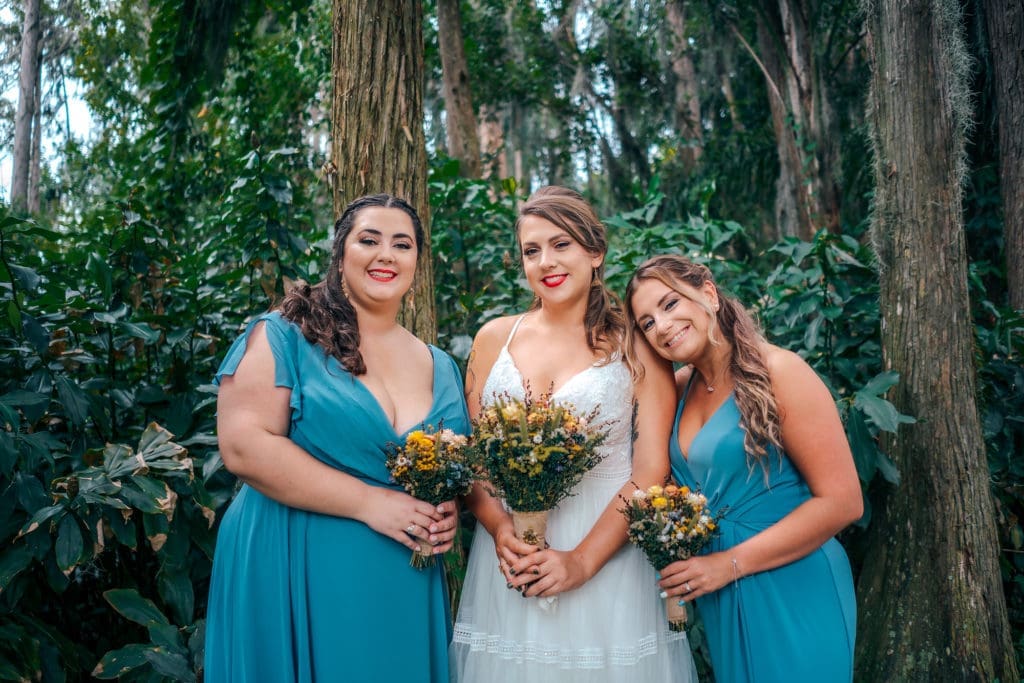 Bride with Bridesmaids at Knotted Roots on the Lake - Land O' Lakes