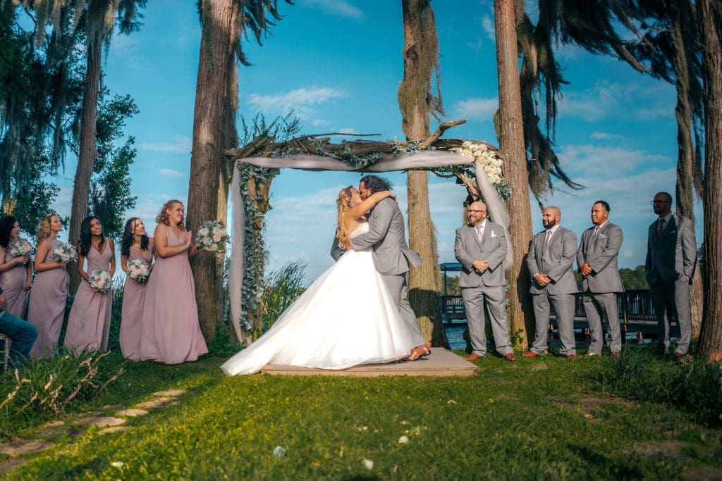 Bride and Groom at Altar at Knotted Roots on the Lake